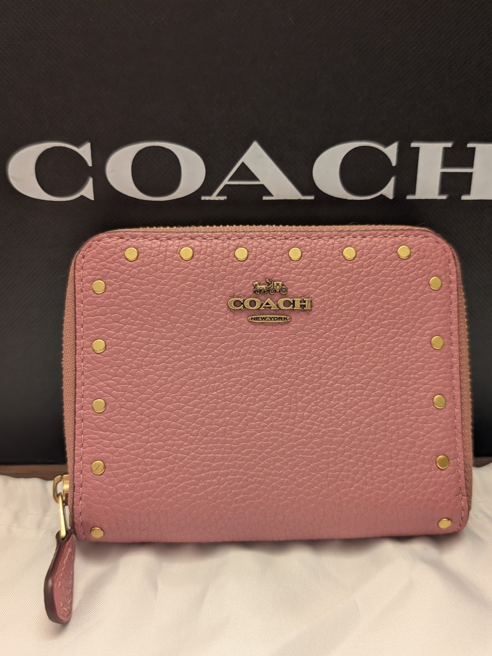 COACH Pink Pebbled Leather Zip-Around Wallet with Gold Studs